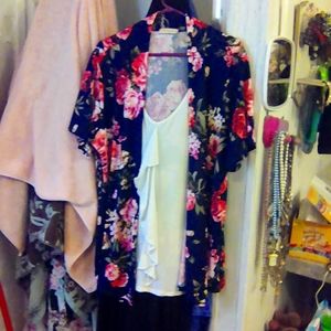 Women's blouse,  dark blue with red and pink flowers. The tank is ivory.